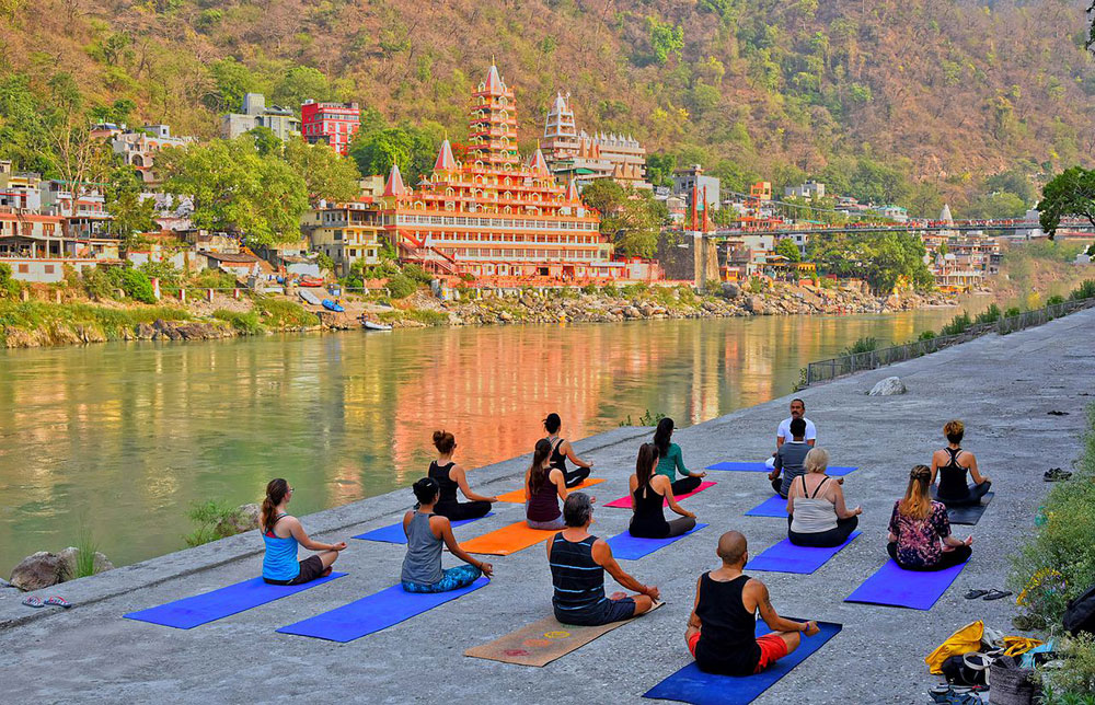 Yoga trainins sessions are a wart of health and wellness travel trends